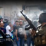 العهد و”الحزب” والبلاغ رقم واحد: صِدَام لا بدَّ منه؟…من القمصان السود إلى الكتاب الأسود