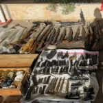 دهم شقتين في الشياح وتوقيف متورّطين وضبط أسلحة حربية وذخائر معدّة للتخزين والاتجار
