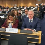 رجي من جنيف: نهجٌ إصلاحي للحكومة قائم على تحرير الأرض وحصر السلاح